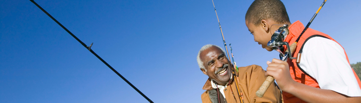 Older man and kid fishing